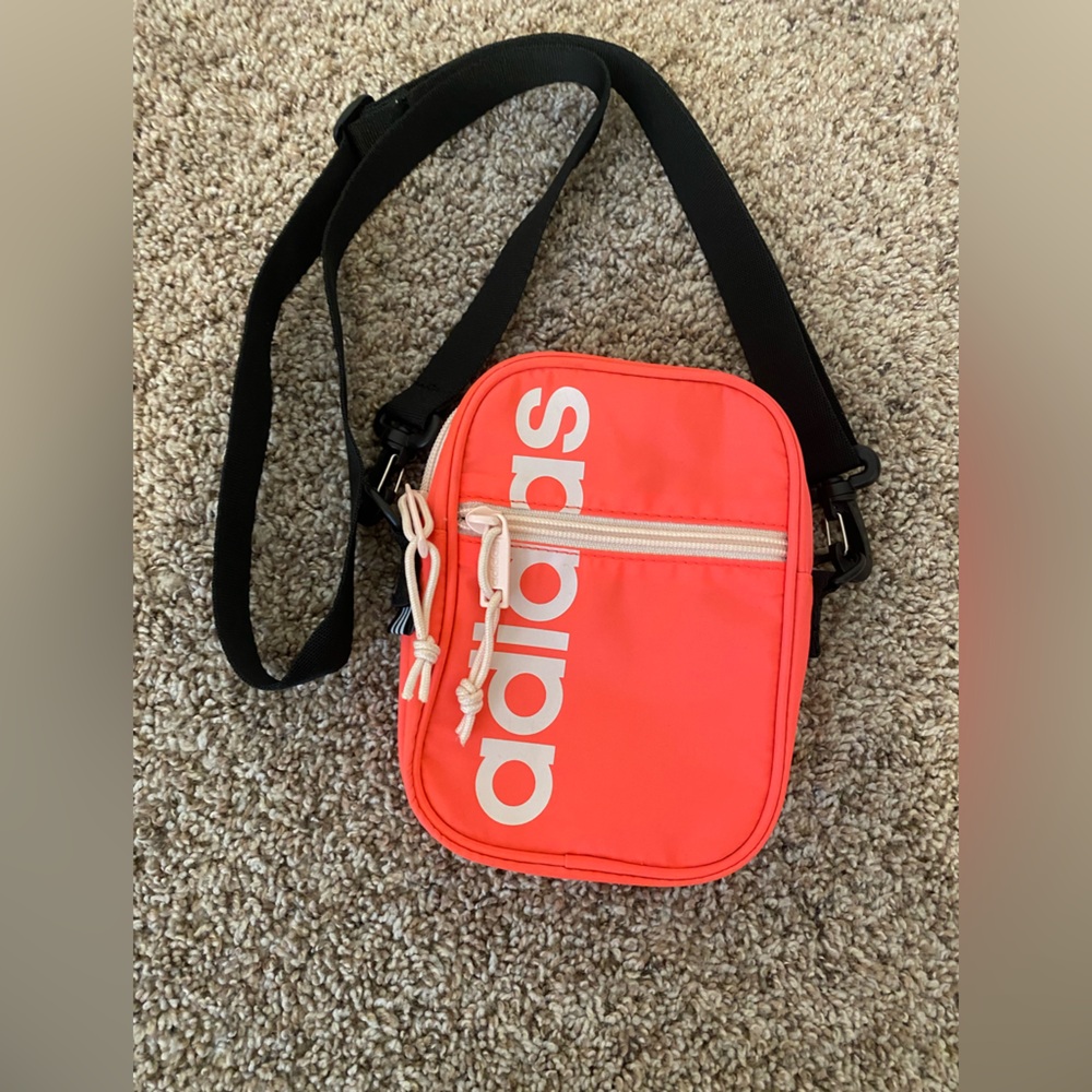 Neon coral colored adidas crossbody